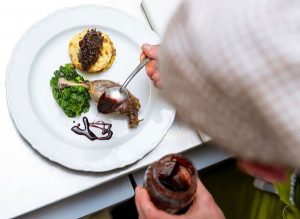 Student Cooking in A Culinary Arts School in Michigan