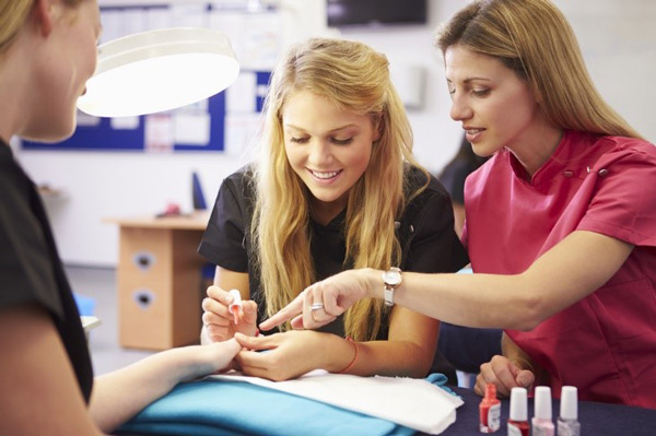 Girl Painting Nails in Michigan Beauty School