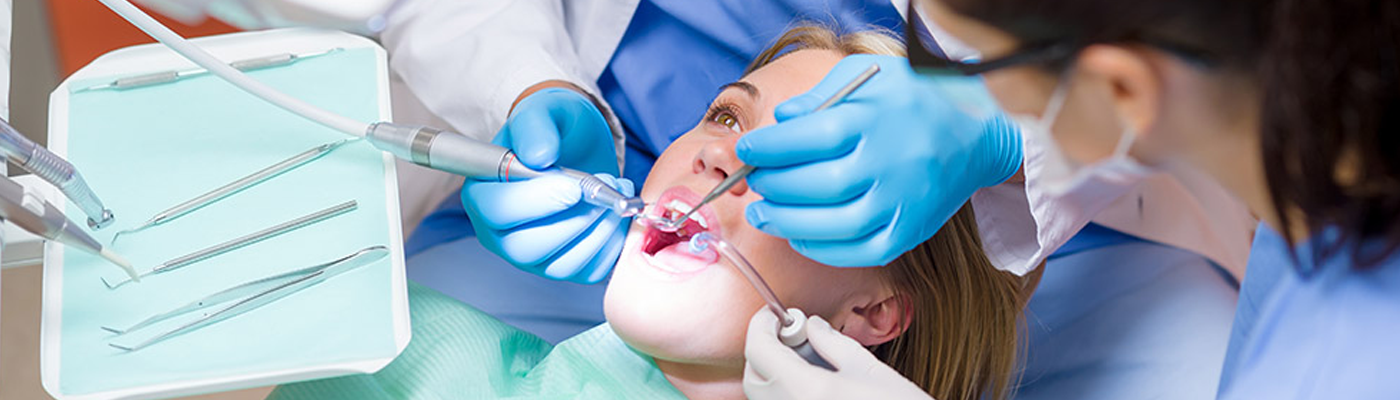 Dental Assistant working on a patient. 