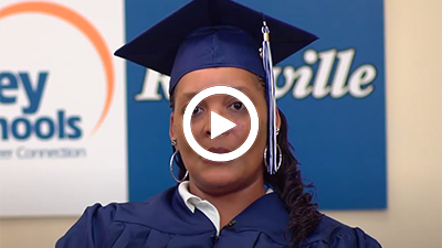 A video play button with Medical Administration and Billing graduate LaShaun.