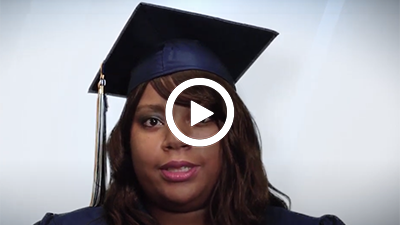 A video play button with Medical Administration and Billing graduate Nikita.